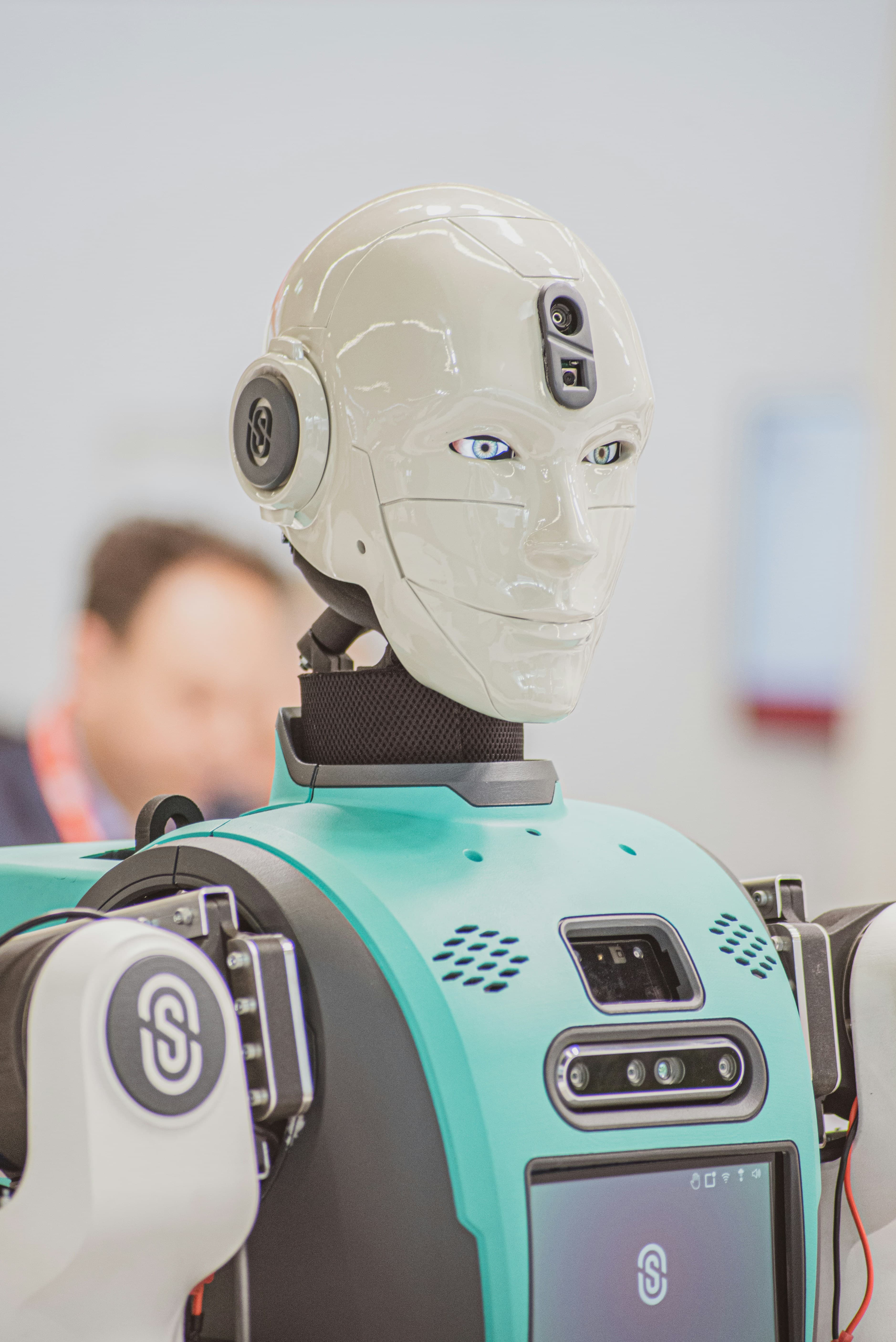 Healthcare professionals working with AI diagnostic tools and patient care systems